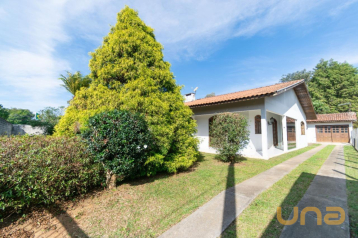 Casa com um amplo terreno à venda no Ouro Verde