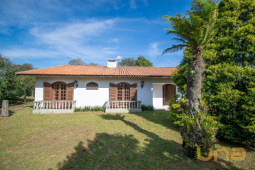 Casa com um amplo terreno à venda no Ouro Verde